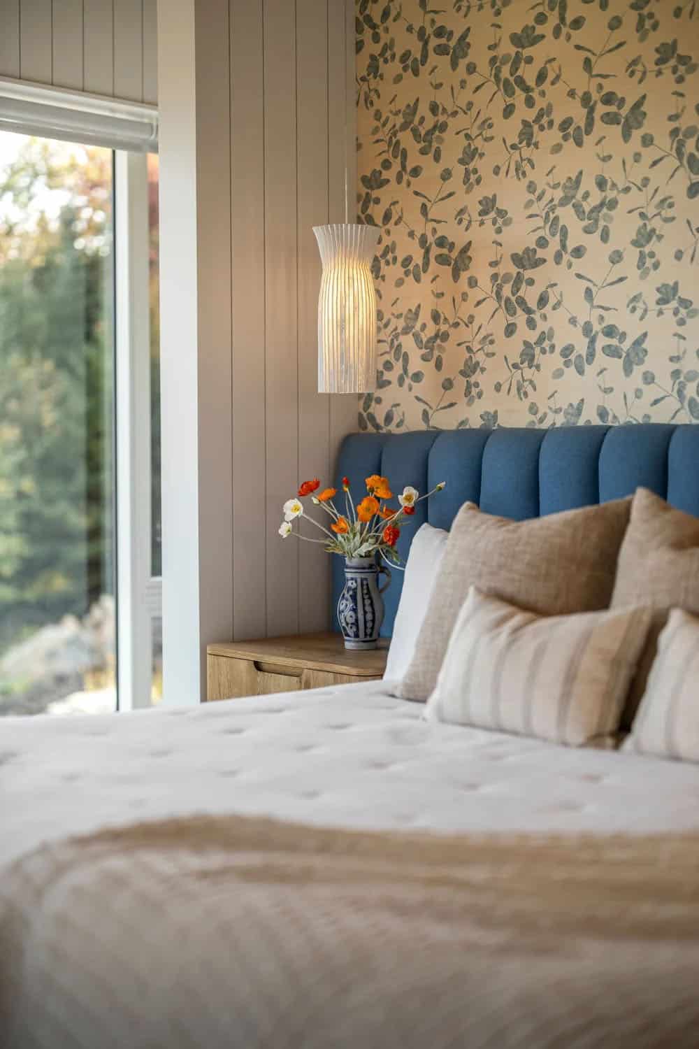 modern bedroom with a custom upsholstered bed