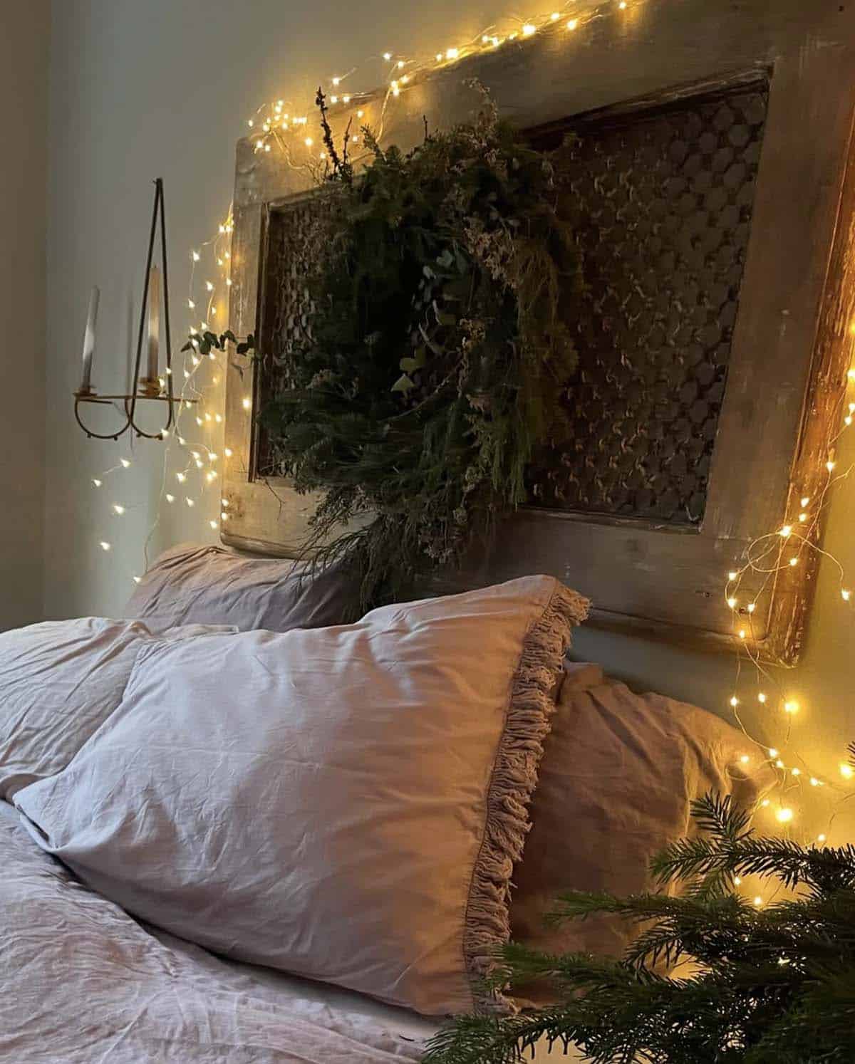 christmas decorated bedroom with fairy lights
