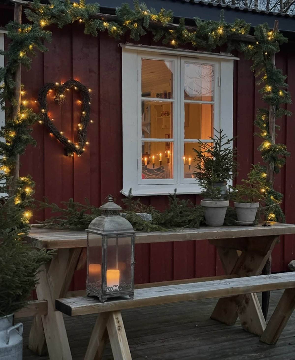 backyard patio decorated for christmas with string lights and a lantern