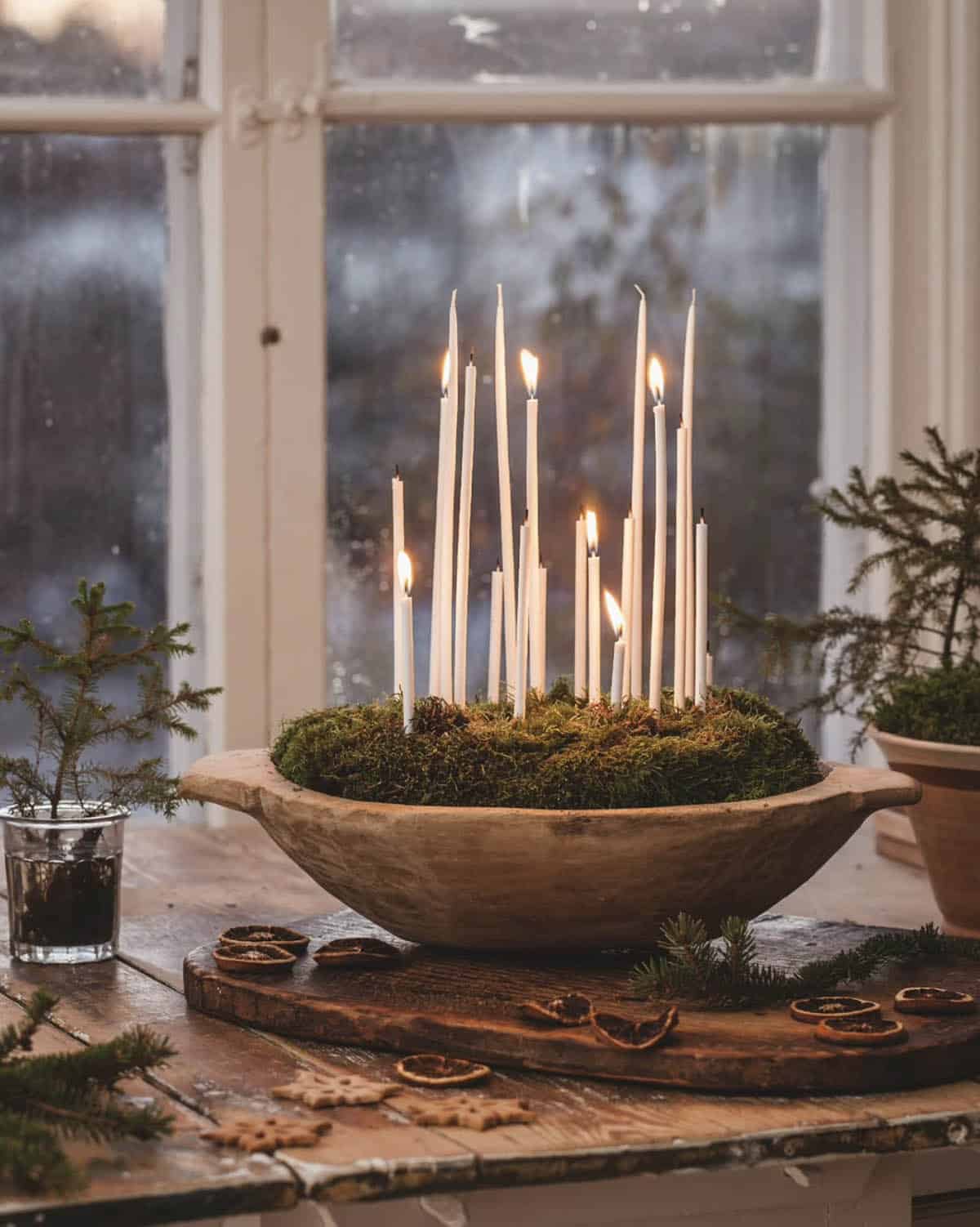 bowl with moss and candles for christmas