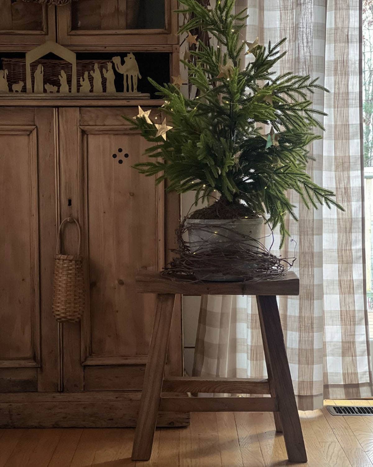 rustic farmhouse style christmas decor with a tabletop pine tree