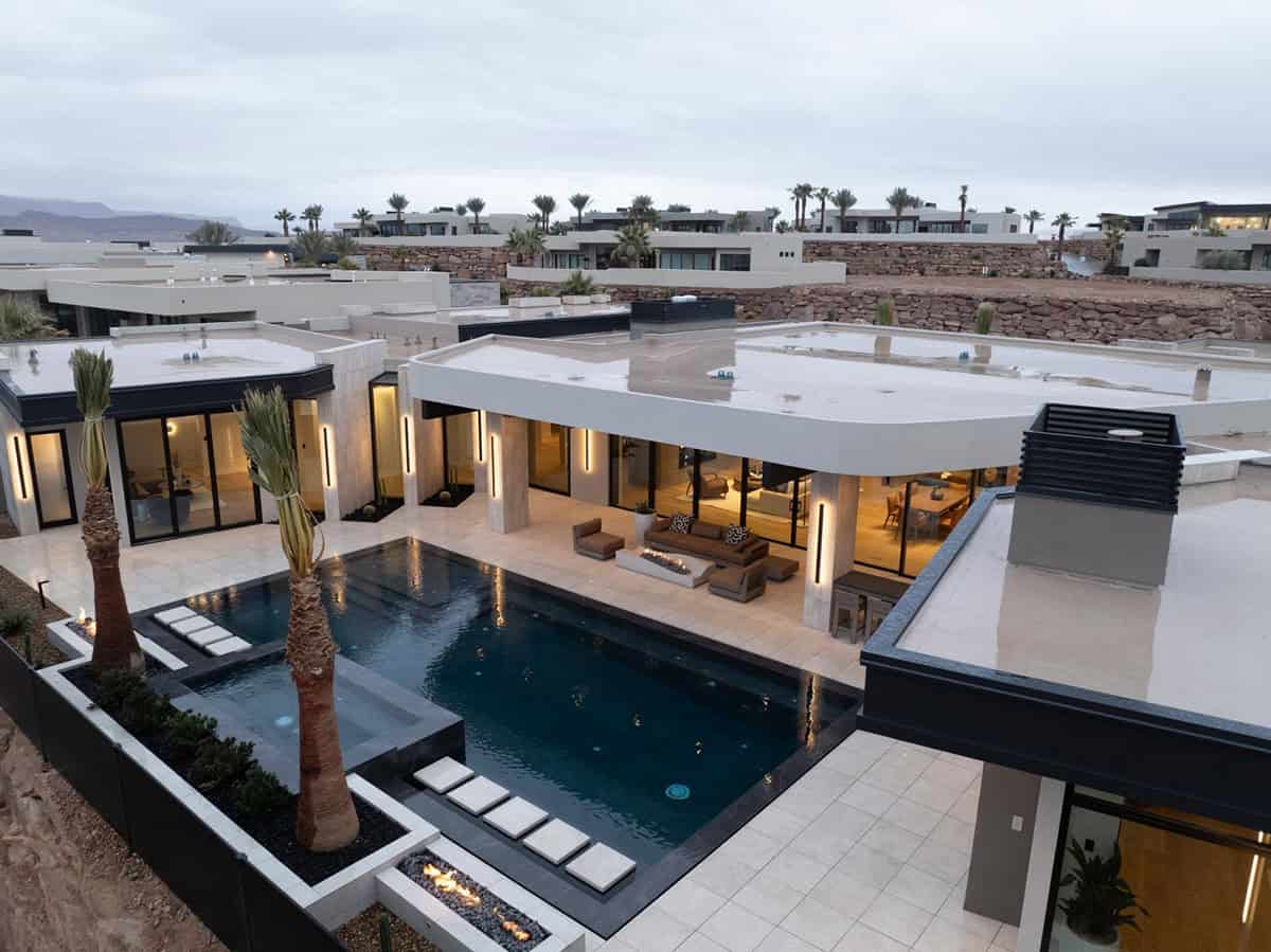 modern desert home exterior with a pool