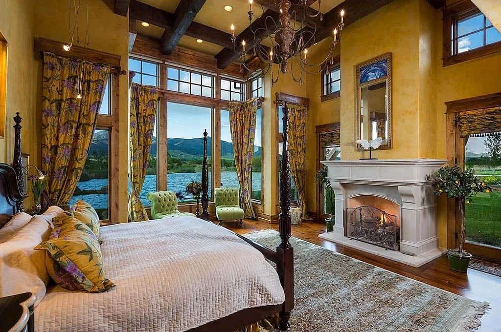 modern rustic bedroom with a fireplace