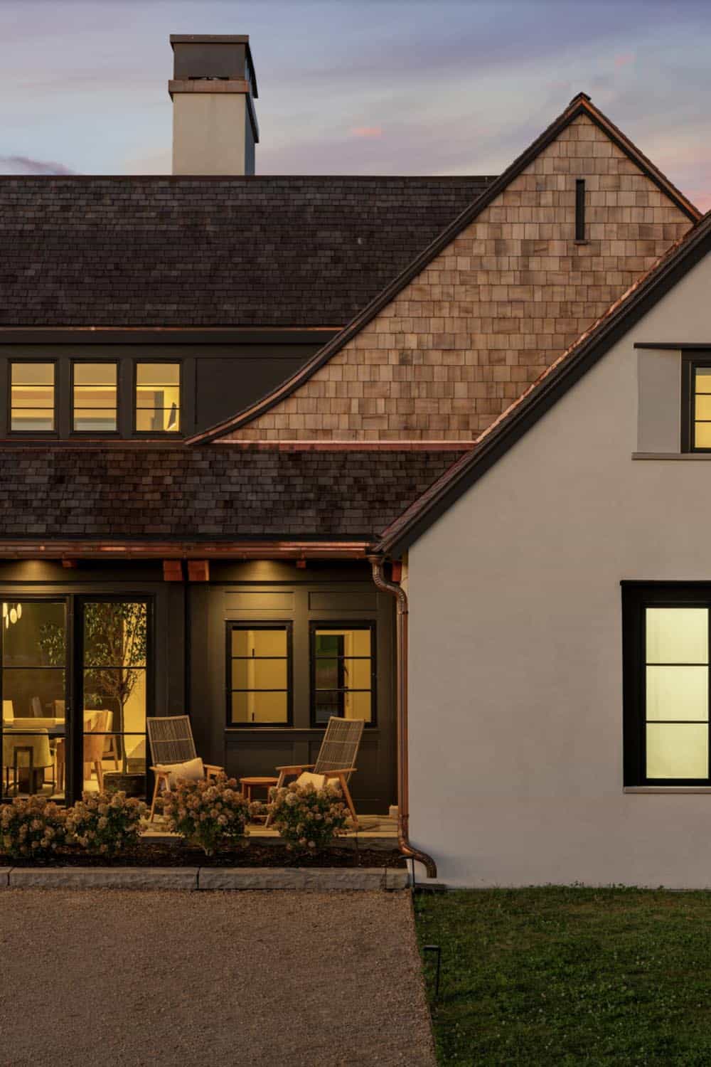 Modern Tudor Home Exterior at dusk