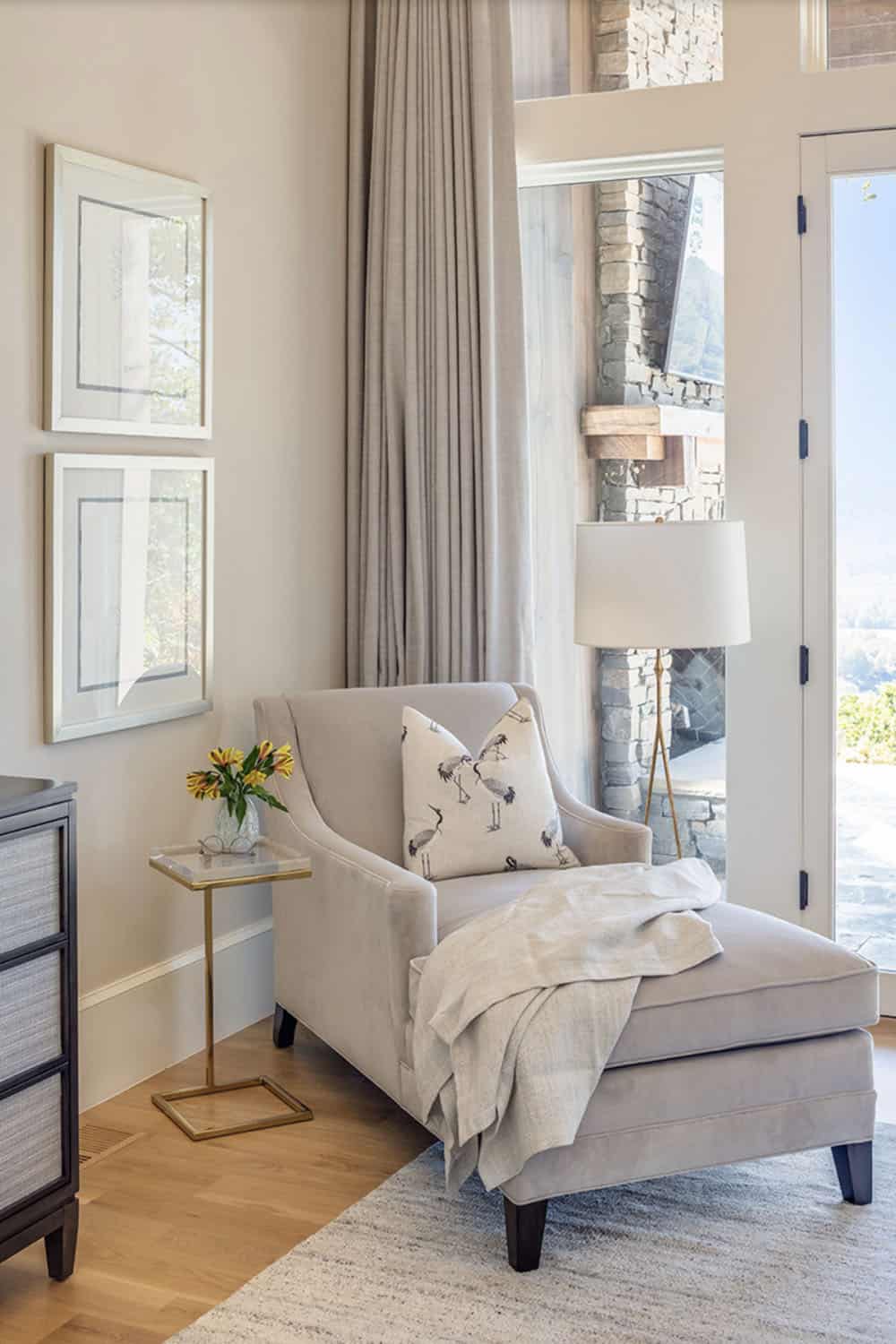 contemporary bedroom with a chaise lounge