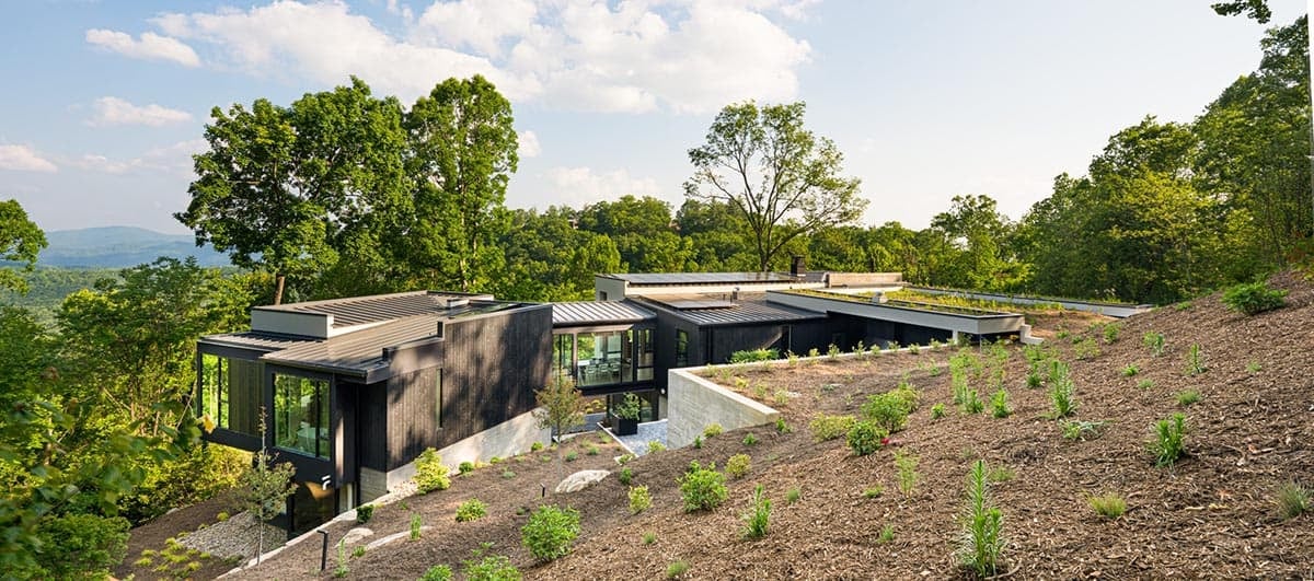 mountain modern home exterior aerial view