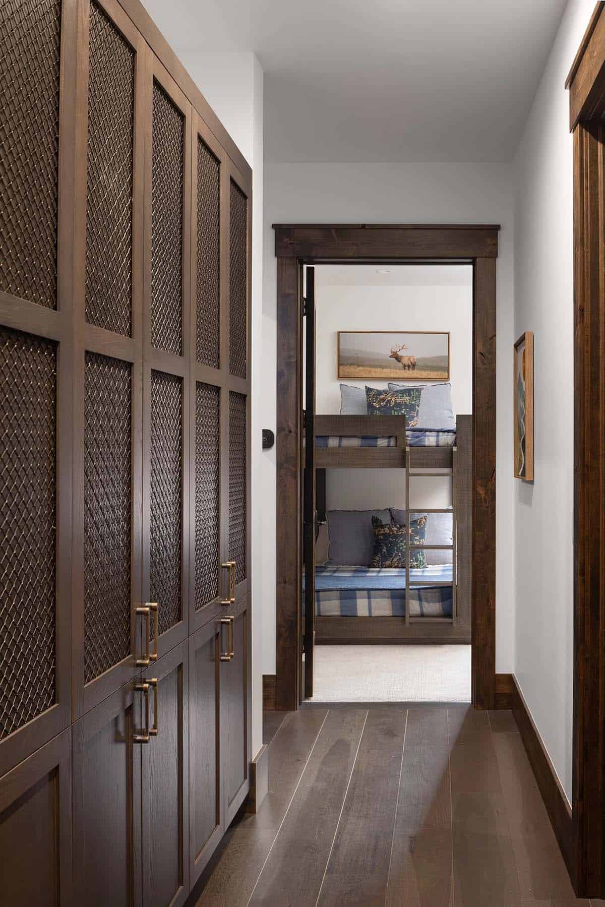 modern mountain style hallway entry into a bunk bedroom