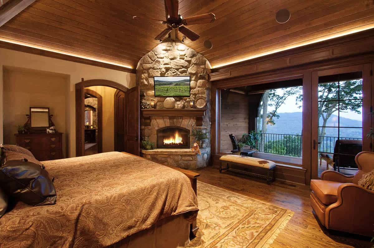 mountain rustic bedroom with a fireplace