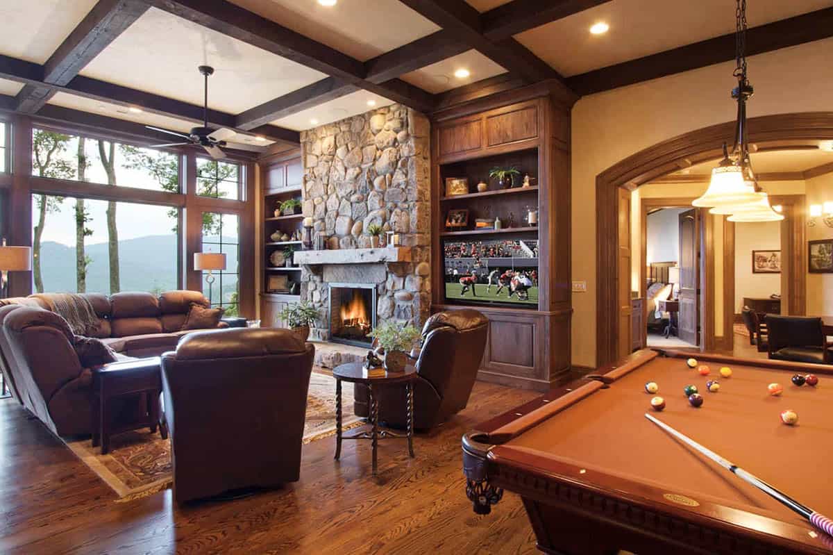 mountain rustic family room with a pool table