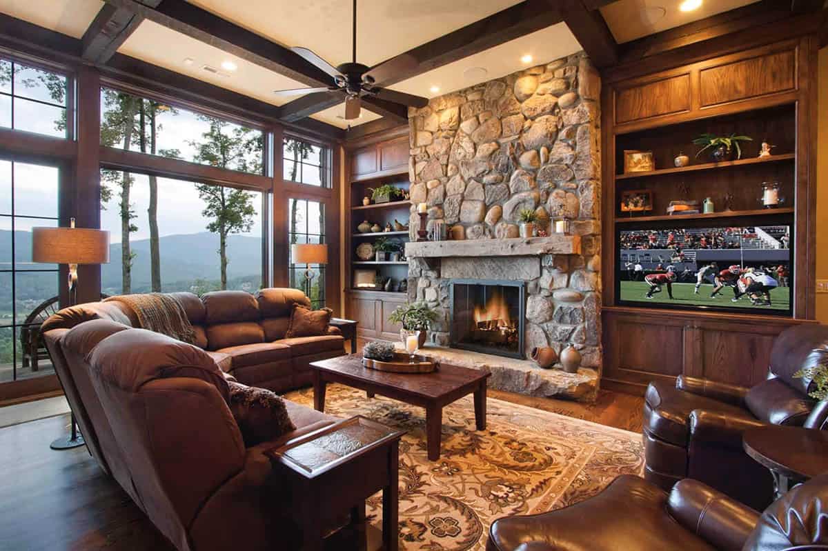mountain rustic family room with a firepalce