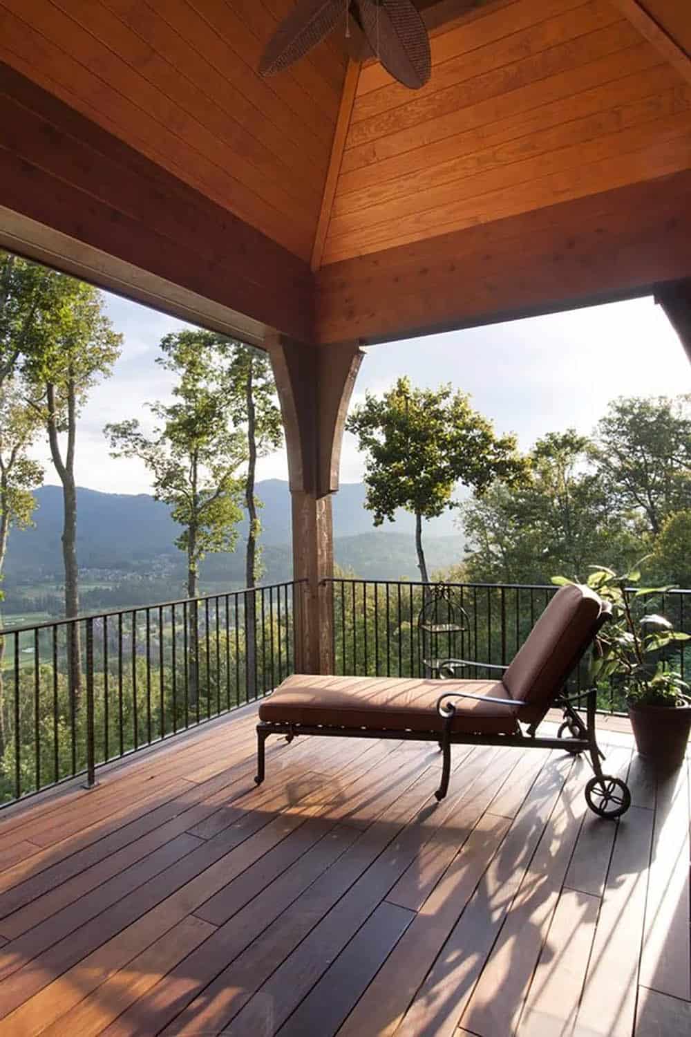 mountain rustic covered patio with lounge chairs