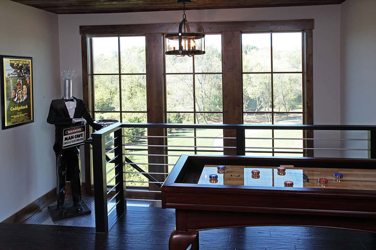 Rustic Family Room with a shuffle board