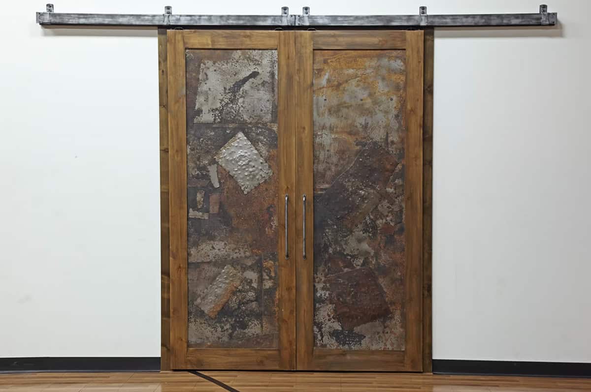 rustic hallway with sliding barn doors