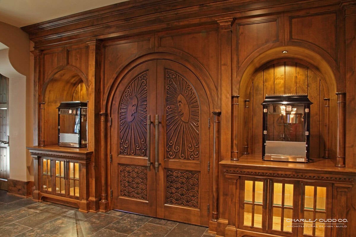 Rustic Home Theater entry with popcorn machines