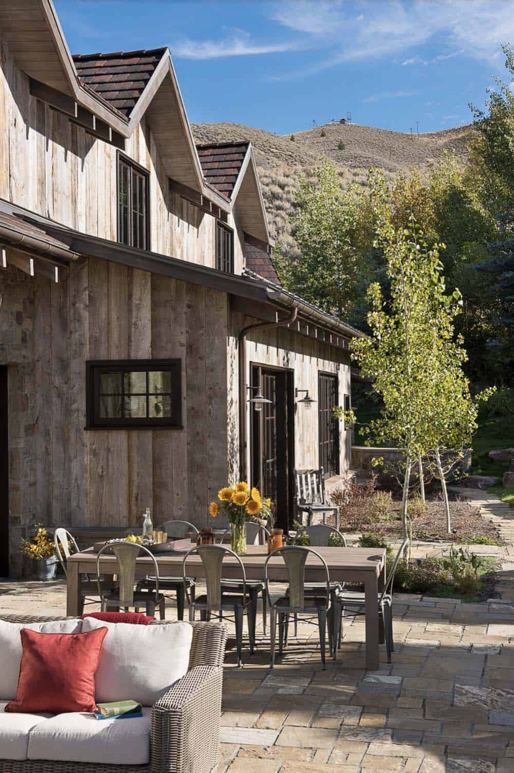 modern rustic home exterior backyard with a patio