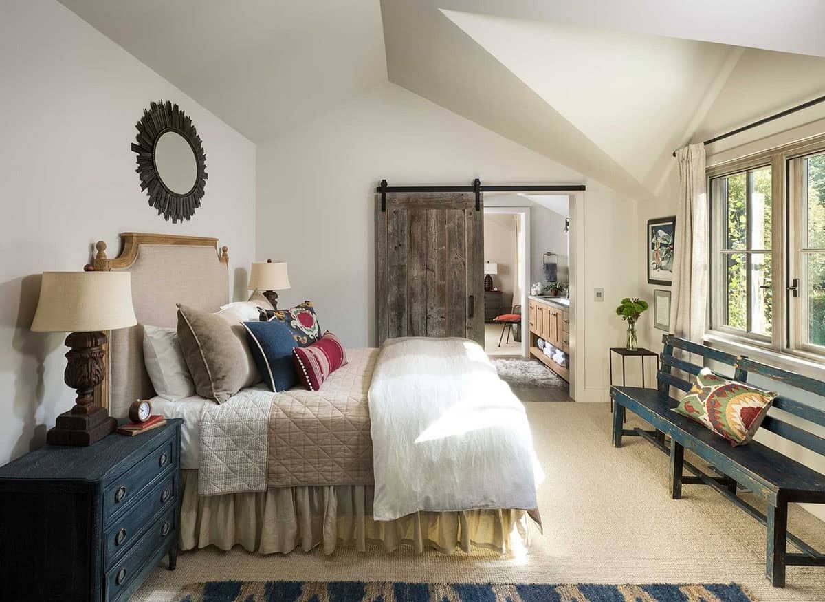 modern rustic bedroom with a sliding barn door