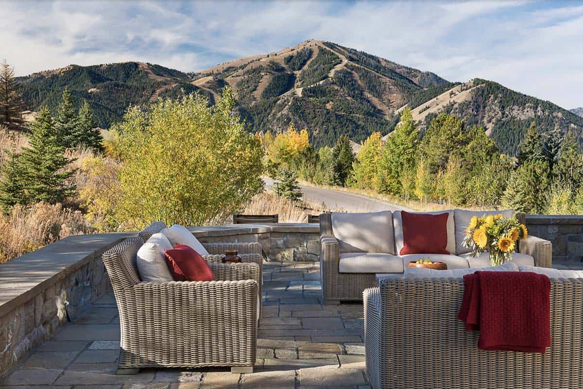modern rustic patio with outdoor furniture and a mountain view