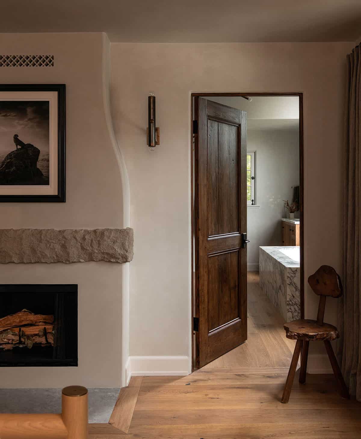 Mediterranean Bedroom with a fireplace