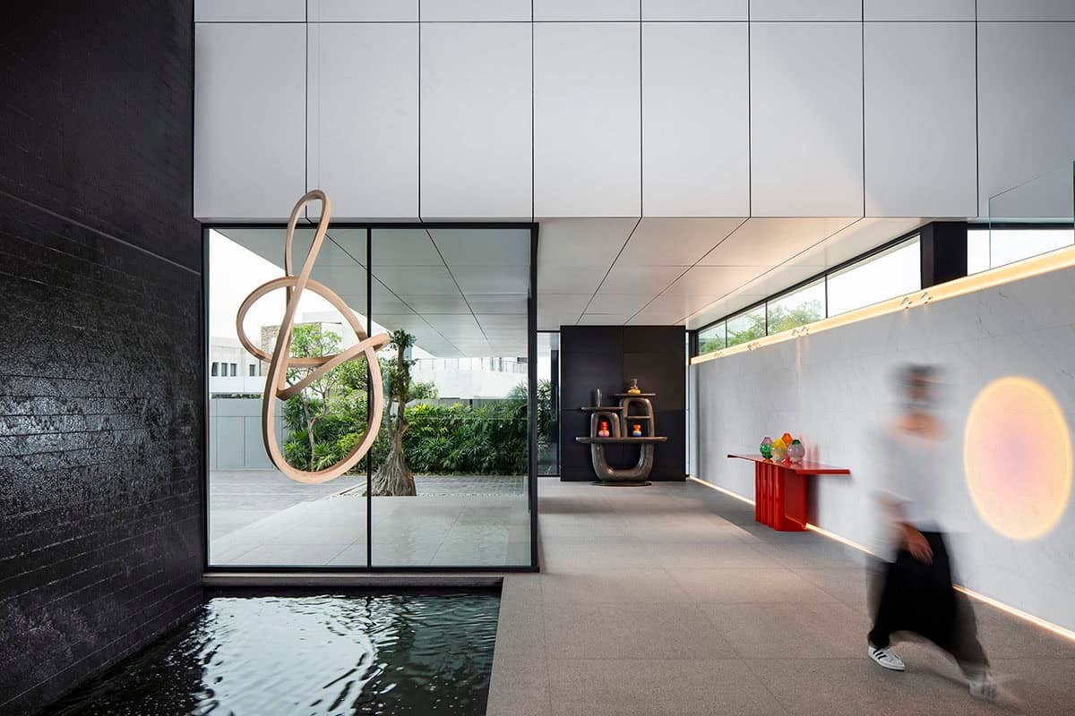 modern waterfront home exterior with a courtyard