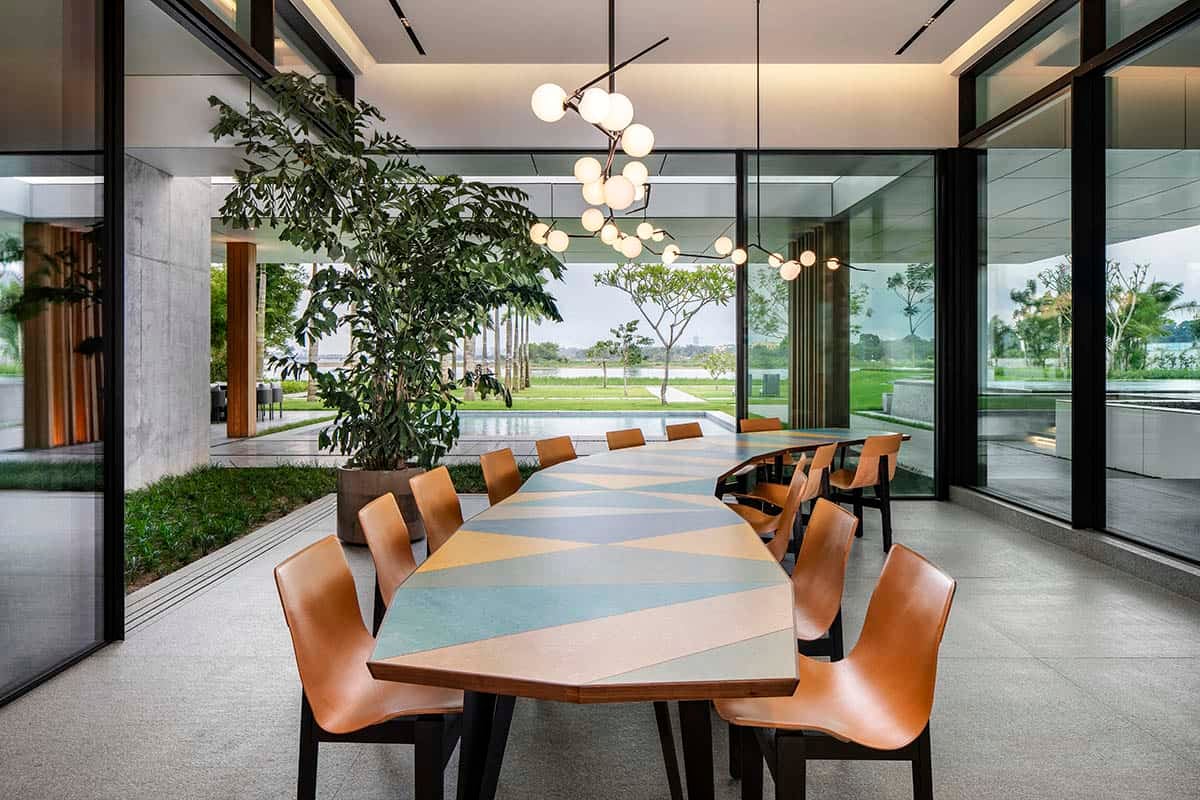 modern dining room with a large chandelier