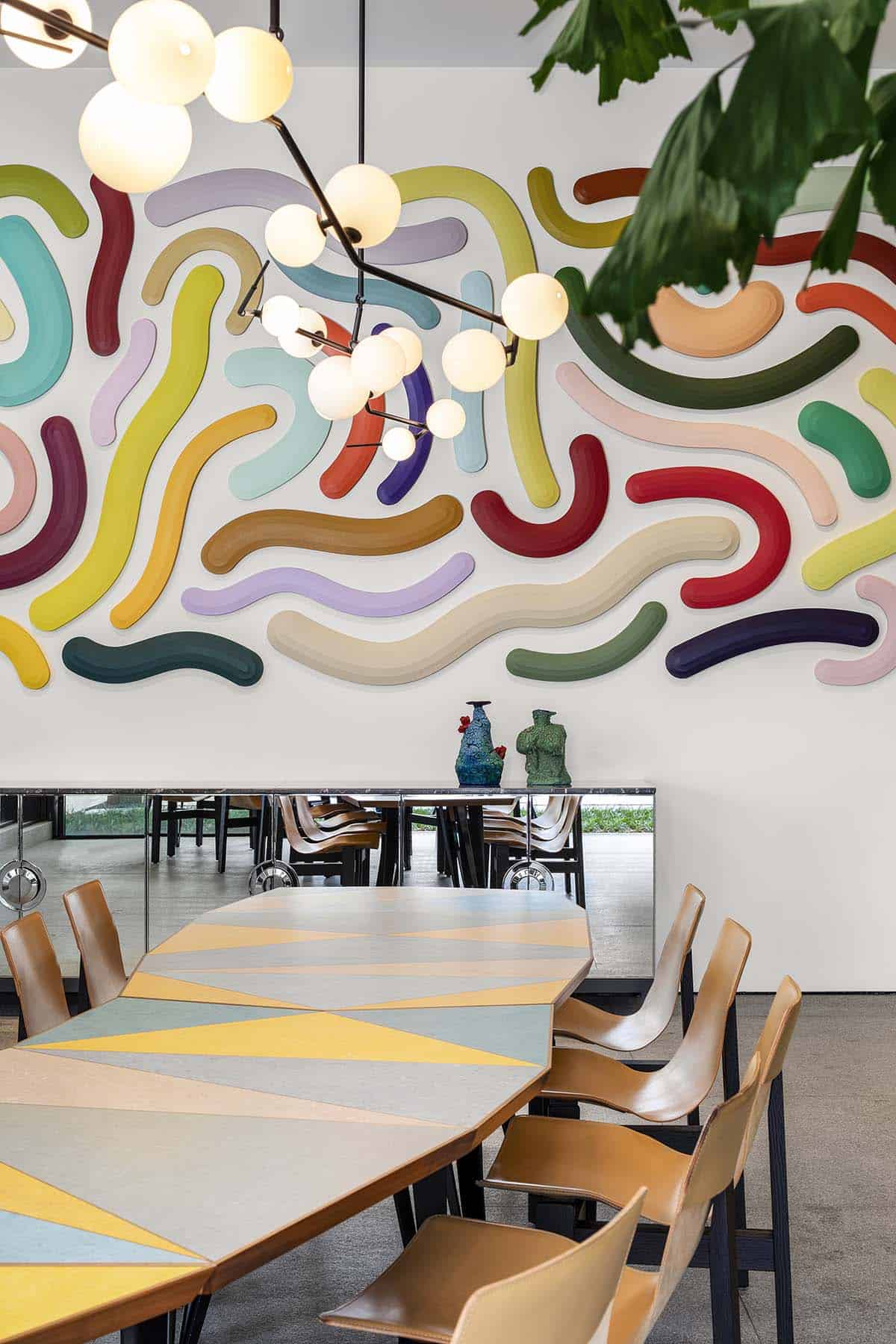 modern dining room with a wall mural