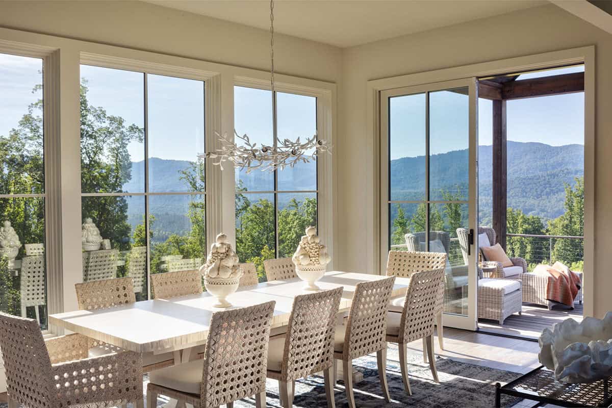 mountain farmhouse style sunroom with alfresco dining