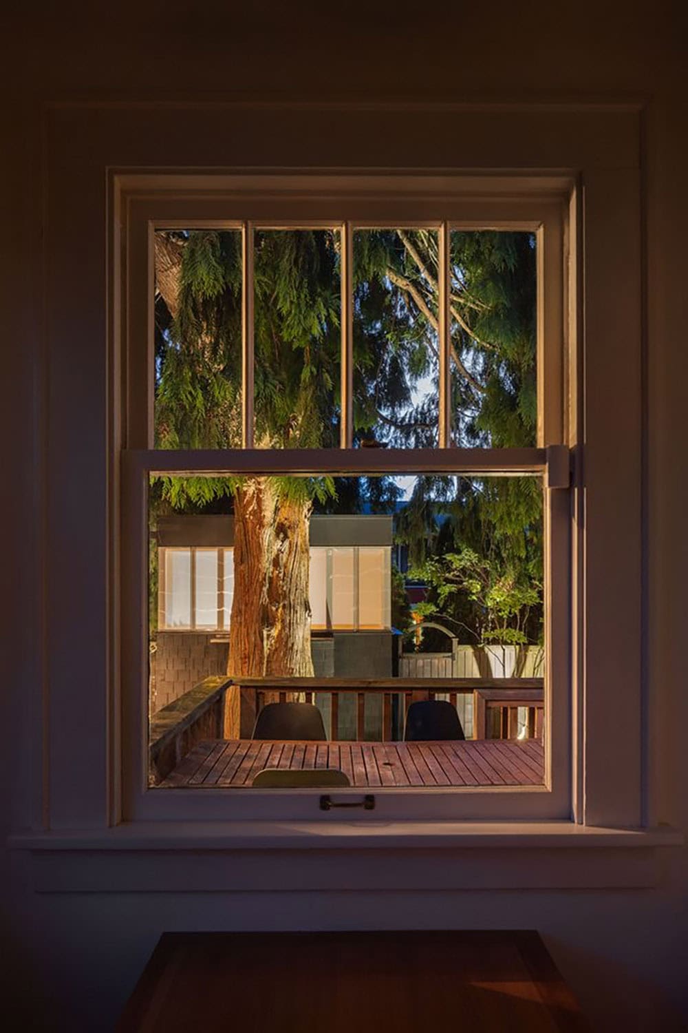 backyard home office exterior at dusk