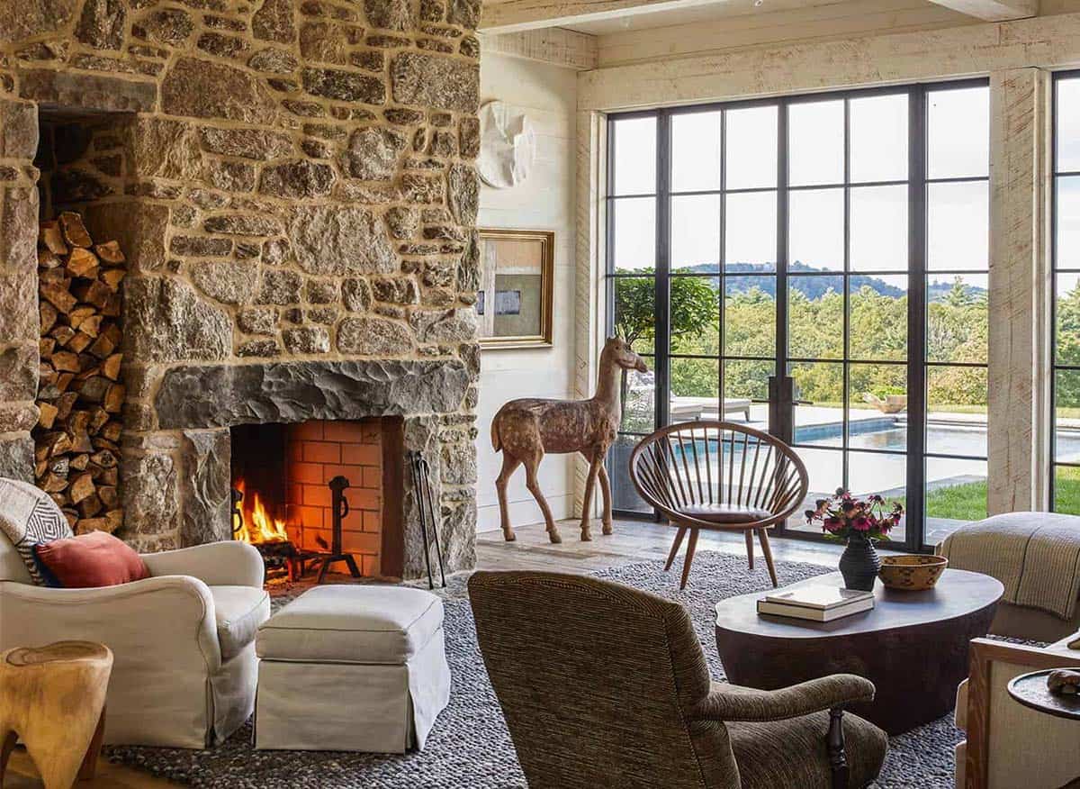 barn style home living room with a fireplace