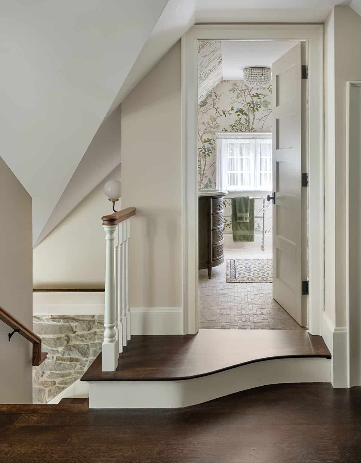 traditional style staircase leading to a bathroom