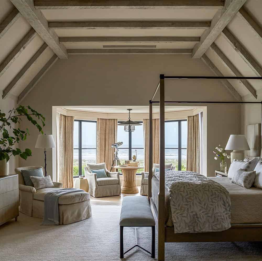 coastal style bedroom with a sitting room