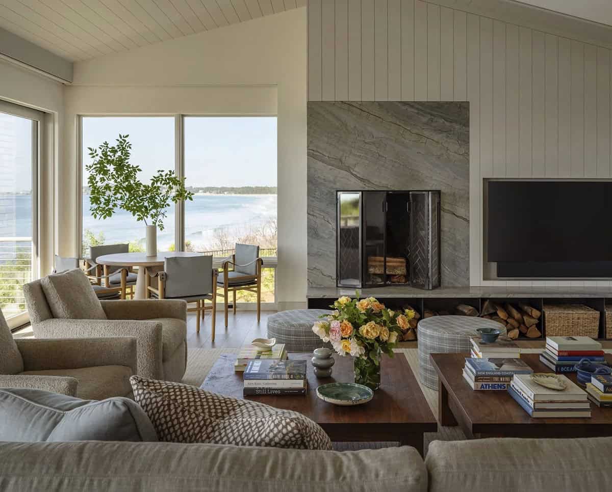 beach style living room with a fireplace
