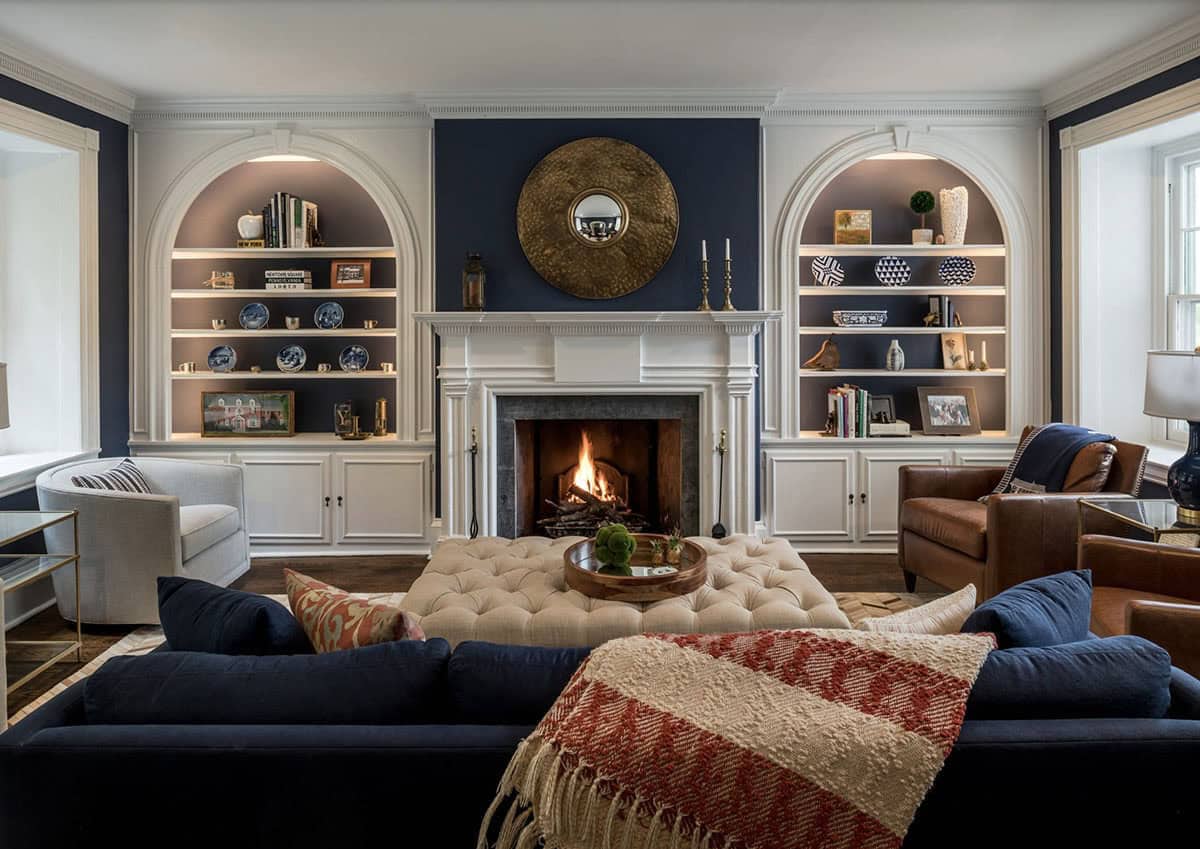 colonial-style farmhouse living room with a fireplace