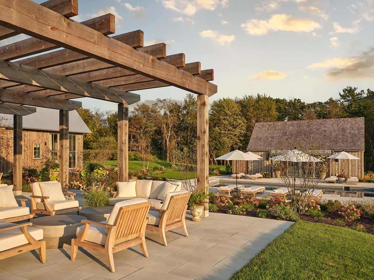 contemporary farmhouse exterior with a pergola patio