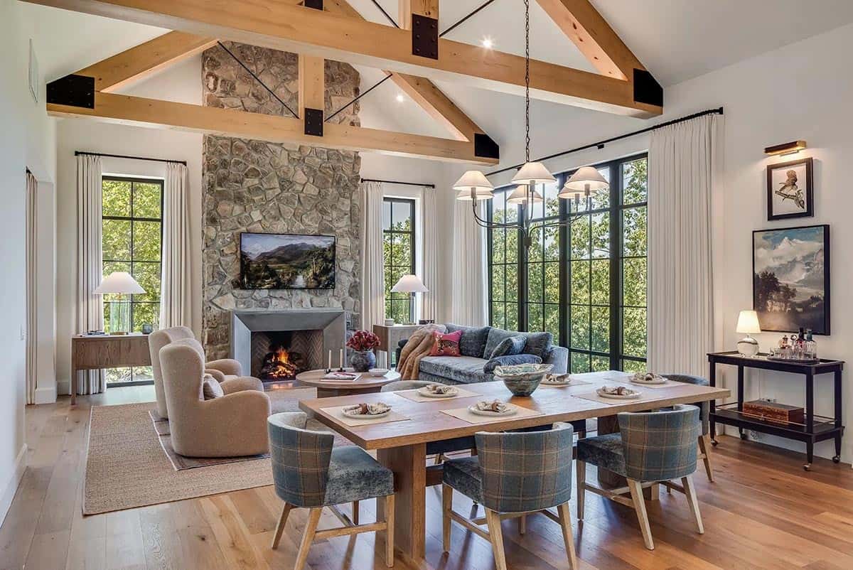 contemporary dining and living room with a fireplace