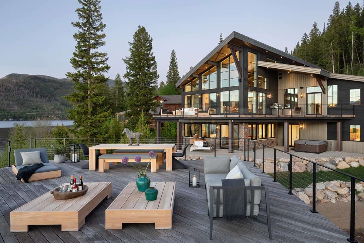 contemporary mountain lake house exterior deck with outdoor furniture