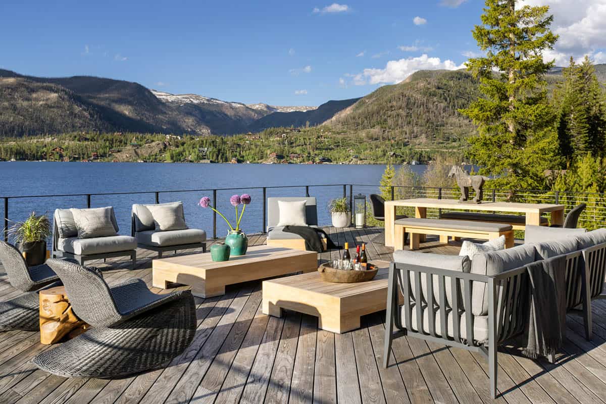 contemporary mountain lake house exterior with a boat house