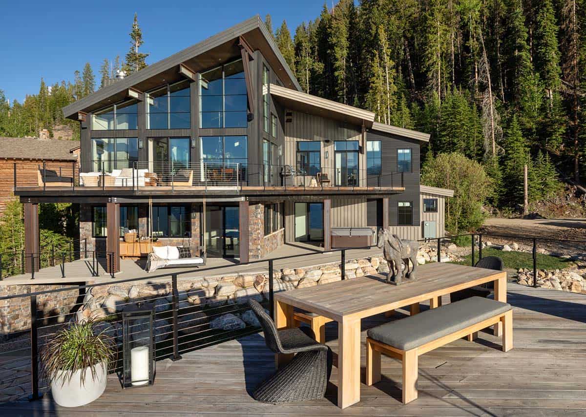 contemporary mountain lake house exterior deck with outdoor furniture