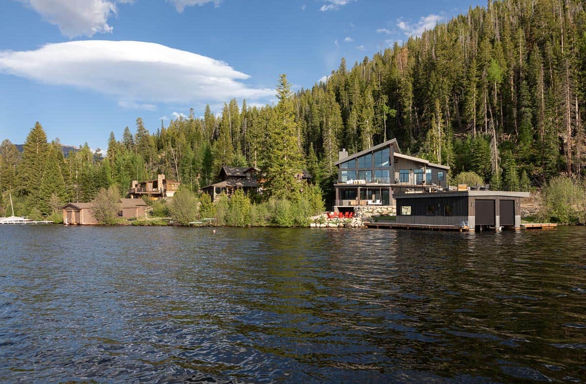 contemporary mountain lake house exterior with water views
