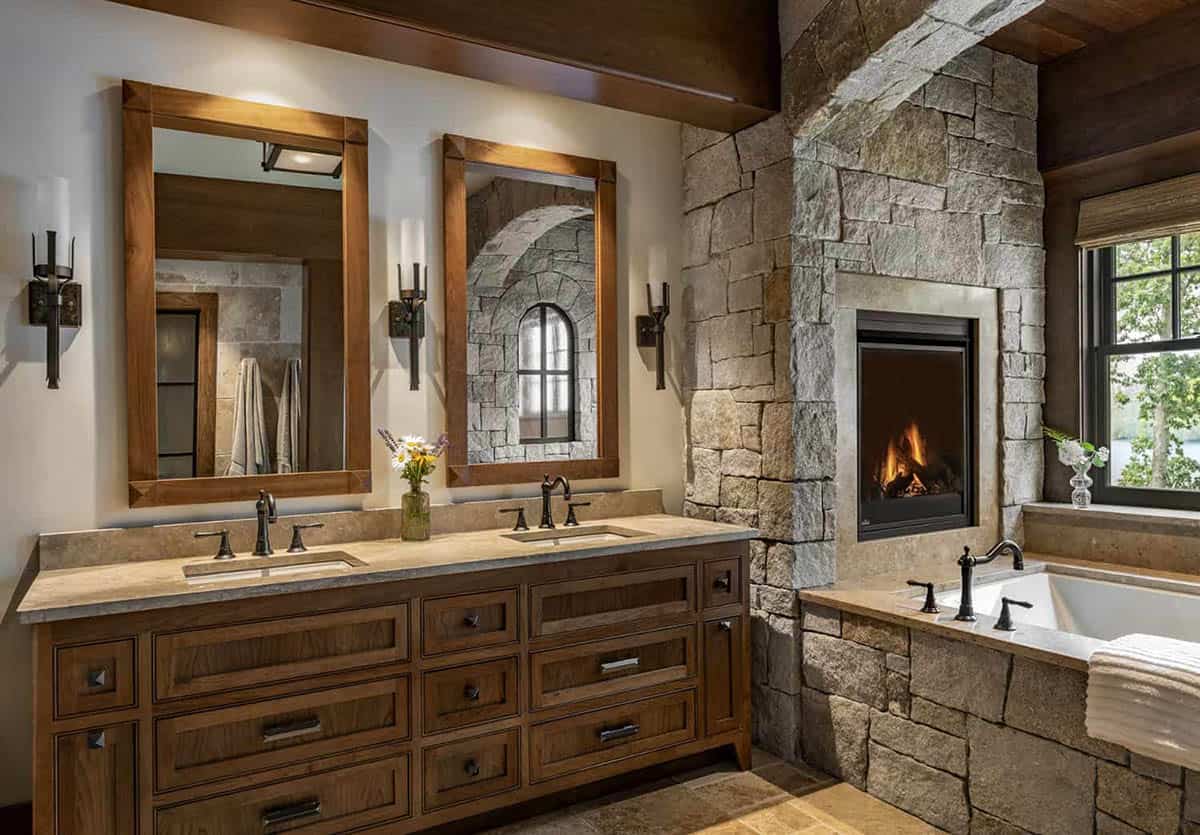 rustic bathroom with a vanity and integrated tub and fireplace