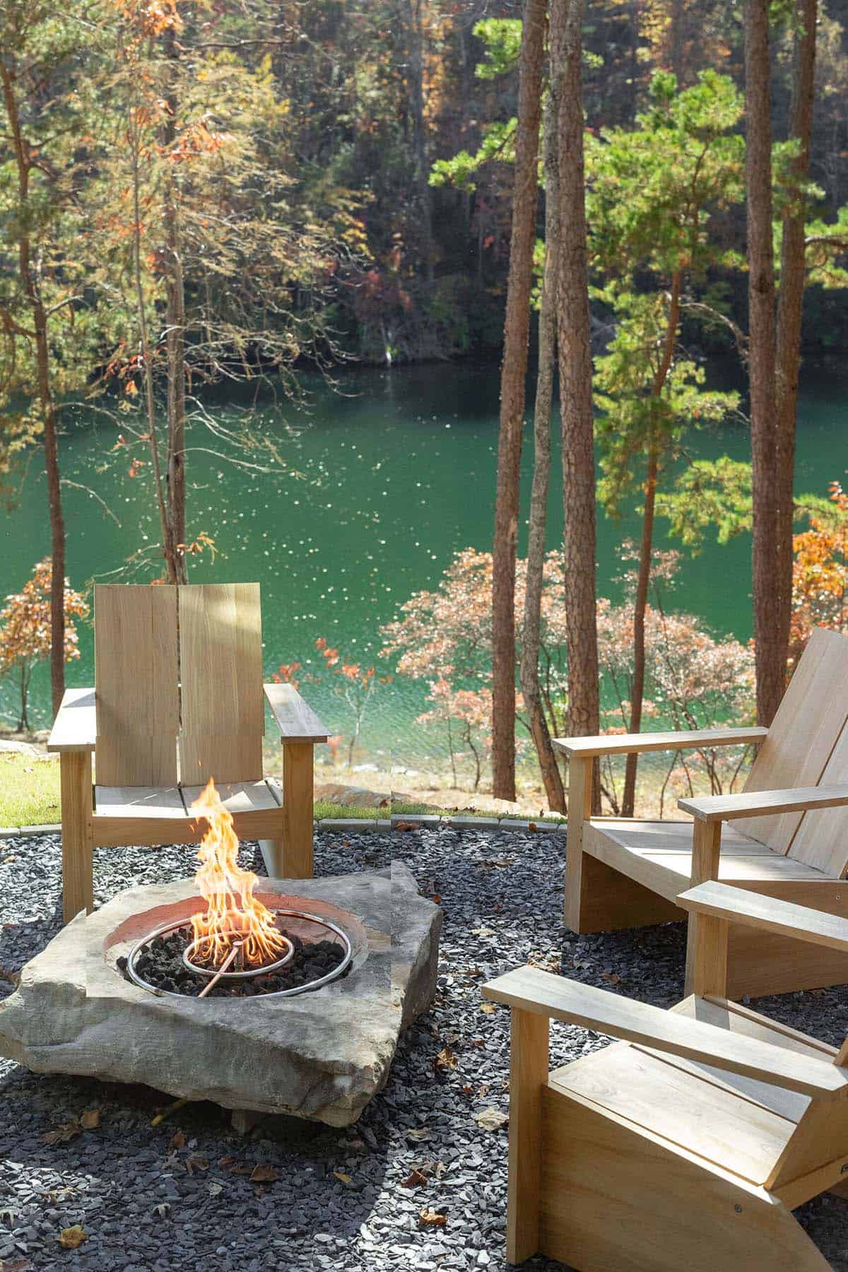 lake house exterior with a firepit