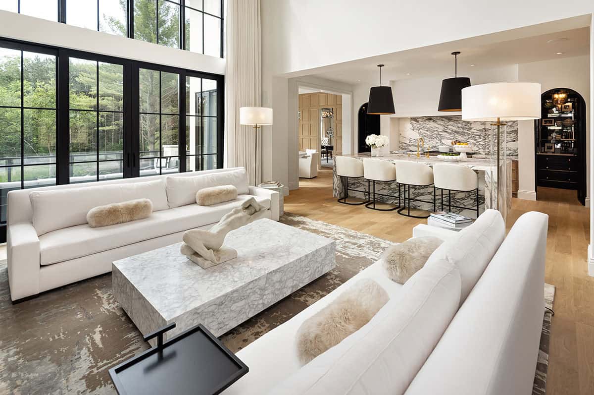 contemporary living room with a view into the kitchen