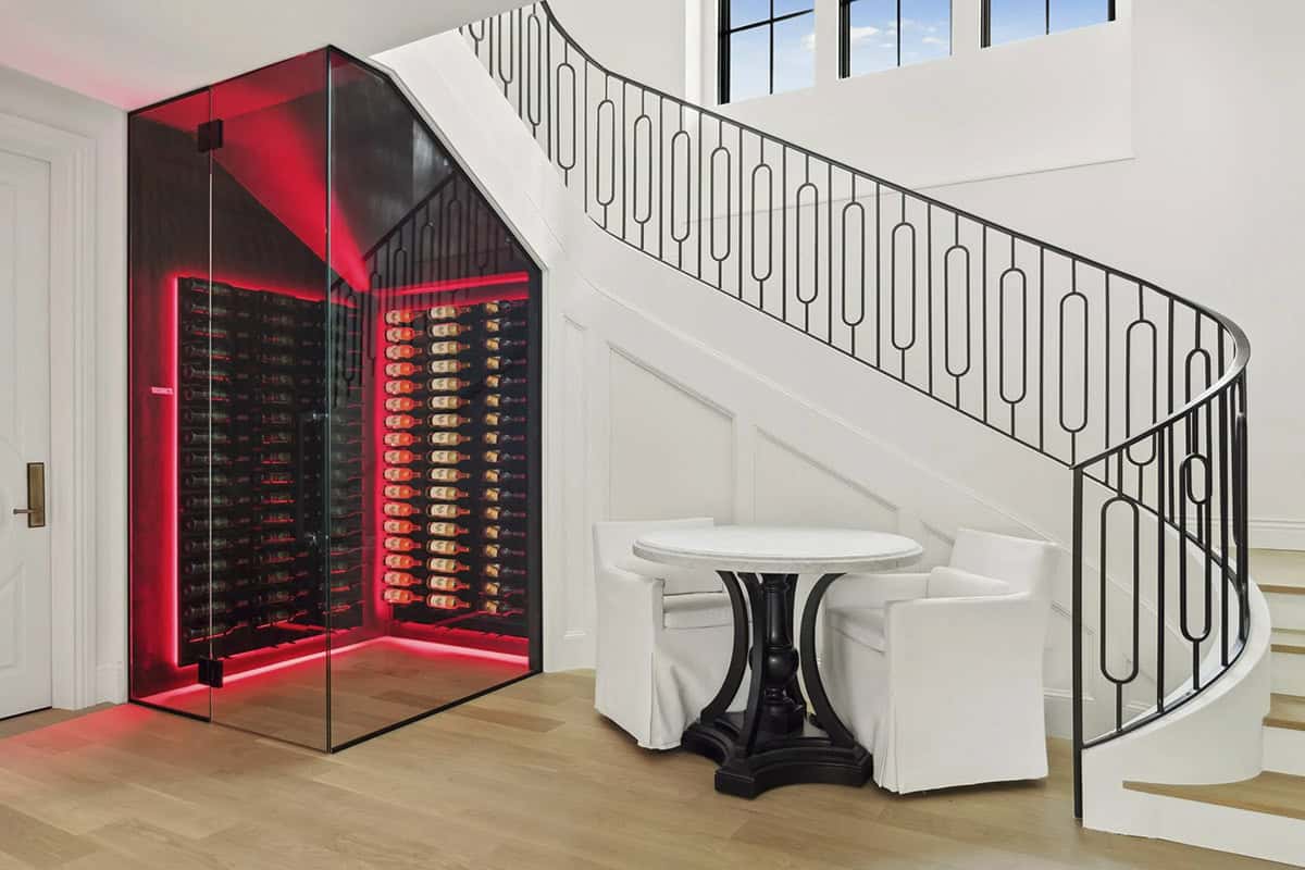 contemporary staircase with a wine cellar