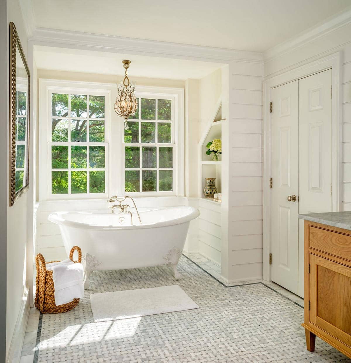 traditonal style bathroom with a freestanding tub