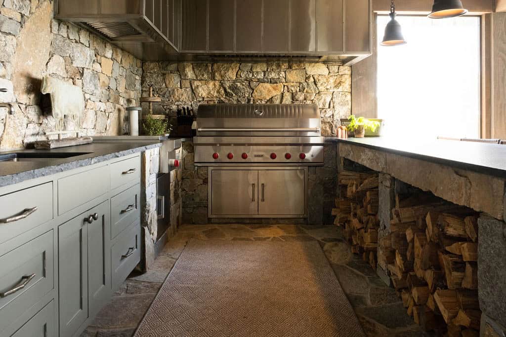 mountain home covered porch with outdoor kitchen