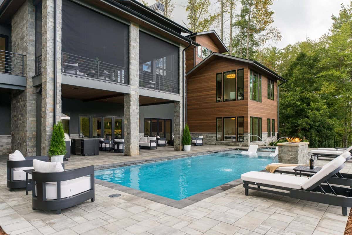 modern mountain home exterior with a pool