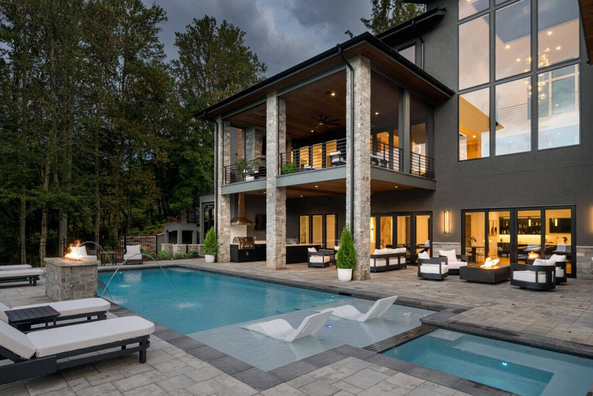 mountain modern home exterior with a pool