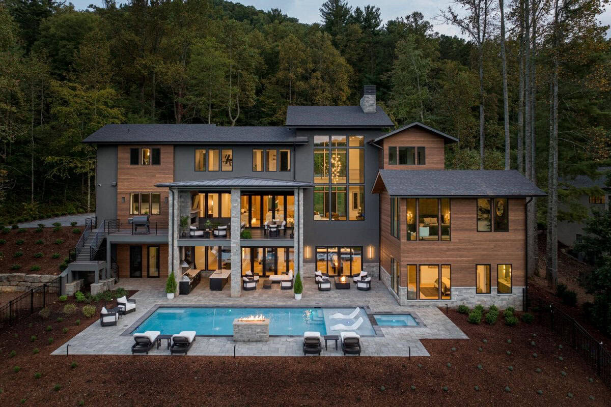 mountain modern home exterior with a pool