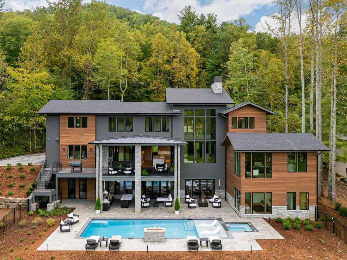 mountain modern home exterior with a pool