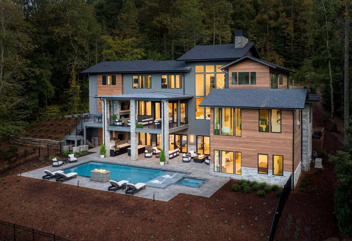 mountain modern home exterior backyard at dusk