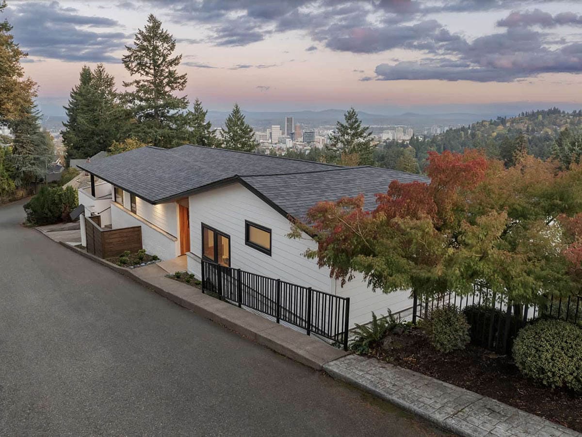 midcentury modern home exterior at dusk
